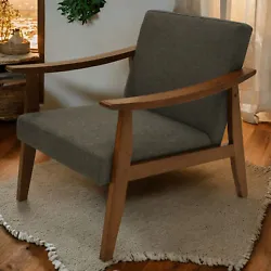 Zenvidas Accent Chair will add retro style and comfortable seating to any room. With solid hardwood construction, the...