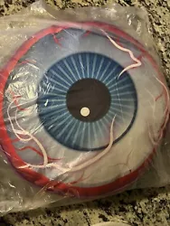 This Astroworld Eyeball Pillow by Travis Scott is a must-have for fans of modern art and amusement park enthusiasts...