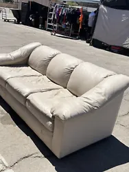 white leather couch used. Condition is Used. Local pickup only.