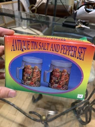 Very cool blue tin salt and pepper shakers featuring a nice bear design. Comes in the original box too! Please see...
