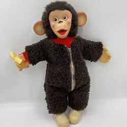 This is a Vintage Rubber Face Monkey Plush Toy With Banana Stuffed animal that measures 19 inches from head to foot...