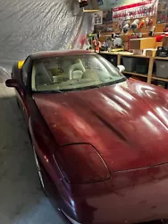 Chevrolet Corvette.2003 anniversary edition, burgundy, currently needs paint on left rear quarter panel and rear...