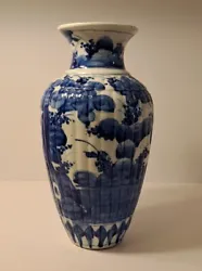 Large hand painted blue and white vase. Heavy