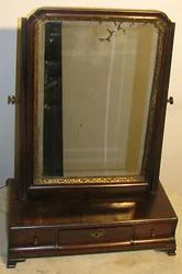 This mirror is supported on two uprights that have the original brass threaded cheval bolts with decorative knobs. This...