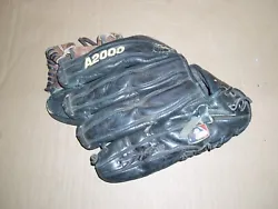 Wilson A2000 Baseball glove. Glove goes on left hand. Size 11 1/2 or 11 3/4. Wear and tear from usage. Scratches,...