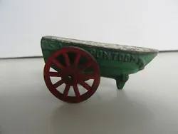 This is the rarer 1930s Pontoon boat on wheels. The toy is in good original condition.