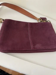 From early-mid 2000’s. Great color, perfect bag for autumn. Used but good condition.
