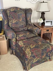 Arm chair with ottoman.