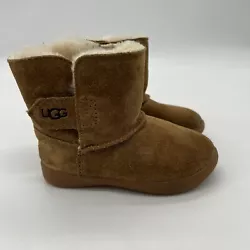 This UGG boot is perfect for your little ones footwear collection. Made from high-quality suede, these boots are...