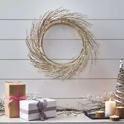 DECORATIVE: From its flexible branches and stunning glitter finish, our wreath perfectly captures the charm of...