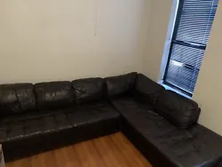 leather sectional couch. Like new in excellent condition. Sectional Black leather couch with only 2 months of use. 2...