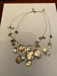 Beautiful vintage hammered metal necklace!It is patined which I think gives it character but you might could clean it...