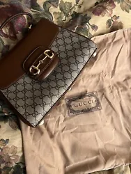 The Classic Gucci bag. Original style sophistication and unmatched quality. Genuine leather and signature monogram.