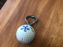 Blueridge golf ball from 60s made into bottle opener.