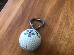 Blueridge golf ball from 60s made into bottle opener.