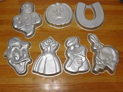 This is a lot of various Vtg Wilton and others Aluminum Party Baking Molds.