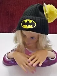 Beanie black hat with Yellow Batman logo on the front and Yellow Pom Pom on the top, you will love it.