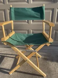 Telescope Directors Chair. ￼. Green canvas back and seat Natural color wood frame. In like new condition.