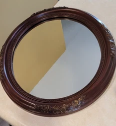 Brown Plastic Oval Wall Mirror -Raised Gilded Flowers is in good condition.