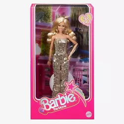 Signature blond hair styled just like Barbie’s in the movie, with glossy disco curls and a sheer hair piece.