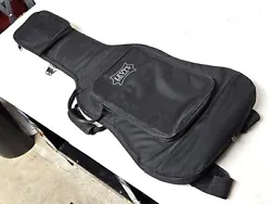 Levys gig bag for electric guitars-. Its older but no functional issues and has very nice padding in my opinion. Inside...