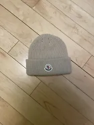 Moncler Beige Beanie Winter Hat - One Size Unisex Small Logo Hat. Condition is Pre-owned. Shipped with USPS Ground...