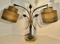 (3) rods accept chandelier bulbs, and the two rods with fine original fiberglass shades accept regular bulbs, with...