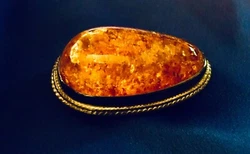 As you know this genuine, untreated amber is about 400 milion years old. The pin was never used. The condition is never...