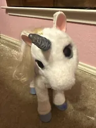 This Fur Real Star Lily interactive unicorn is in good shape. It still moves and has sound. It , however, does NOT come...