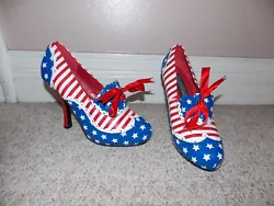 This is a pair of Fantasma Step Into Fun fantasy high hell shoes in excellent shape. They are size 8 and mode/design...