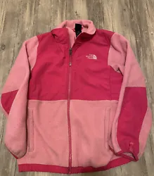 The North Face girls size 18 XL pink fleece zip up jacket. Jacket is in super great condition and is very warm. It’s...