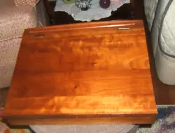 I do not know what type of wood but the desk top is in perfect condition and just beautiful. The top has an area for...