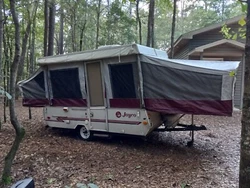 The canvas was just treated last winter and always parked in the shade. Great little starter camper.