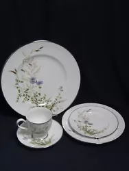 HERE WE HAVE : 1 - 5 piece place setting of Noritake Ireland Edenderry series china. Delicate floral design on a white...