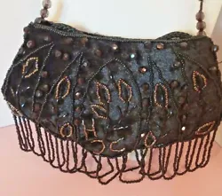 No stains or odors ~ Basically, this is just a delightful little bag! The beadwork is of little branches with shiny new...