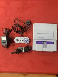 super nintendo console. See photos! No AV cables included