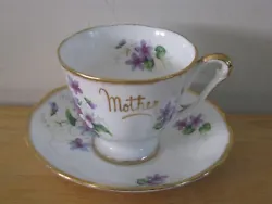Previously owned, excellent condition. Made in England. The cup stands 3
