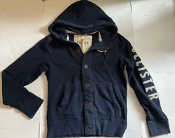 Preowned Hollister hooded button up sweatshirt. Buttons up the front. Preowned. Has distressed styling with wear...