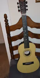 First Act Discovery acoustic guitar  FG1106 needs 1 guitar string & needs to  be turned  in good condition.