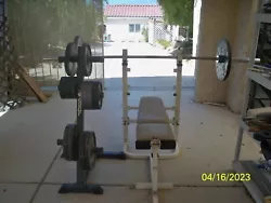 Olympic Weight Bench set with bench, weights and weight holder. Bench covering is like new. Weights included Las Vegas...
