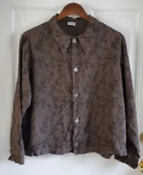 CP Shades 100% rayon brown button down blouse. Embroidered floral print all over.