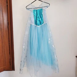 Beautiful dress. cotton lining and soft tulle.  The only flaw I can find is a small tear of the cape that is attached...
