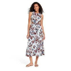•Sleeveless cutout maxi dress •Large leafy floral print in teal and burgundy •100% cotton fabric •Crew...