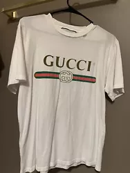 Auth Gucci Washed T-Shirt Gucci Logo Made In Italy (S) Wore a few times . Dry cleaned only . Good condition . Authentic...