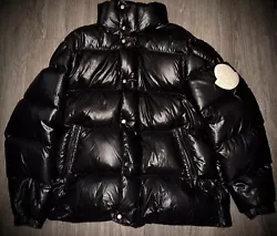 This Moncler Genius jacket is a size 7 and fits regular sizes 2XL.