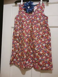 Handmade girls sundress. This dress is gorgeous with my purposes for wear. Machine washable in cold water.