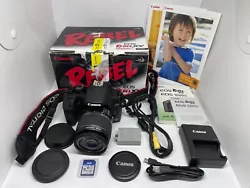 Canon EOS Rebel XS 1000D. Lens Clean. EF-S 18-55mm 3.5-5.6 IS Lens. LCD has light scratches. 4GB SD Card. USB Cable.