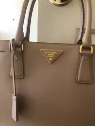 Prada Saffiano Leather Medium Bag . Condition is Pre-owned. Shipped with USPS Priority Mail.Crafted of richly saffiano...