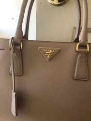 Prada Saffiano Leather Medium Bag . Condition is Pre-owned. Shipped with USPS Priority Mail.Crafted of richly saffiano...