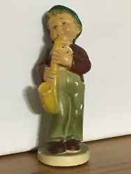 Vintage (1940s) ARS SACRA Figurine Boy with Saxophone Instrument ~ Made in USA.   Has some paint scuffs from age.  